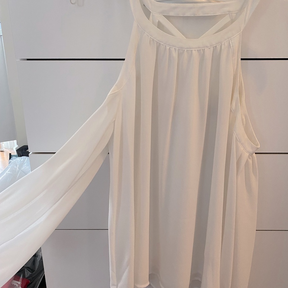 White flowy blouse with shoulder cut outs